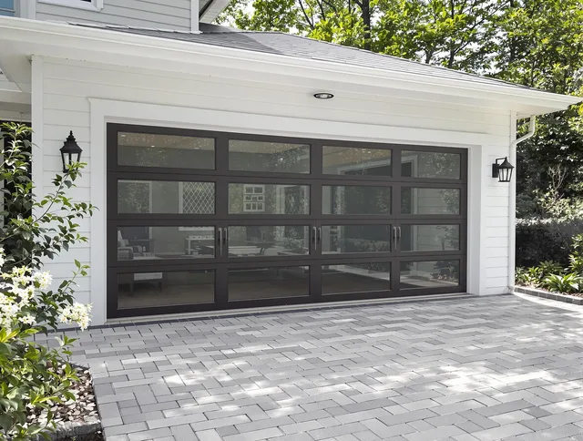 Warrensville Heights Garage Door Repair design specialist presenting custom garage door options to Warrensville Heights homeowner