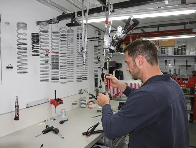 Warrensville Heights Garage Door Repair safety certified technician performing precision spring replacement in Warrensville Heights