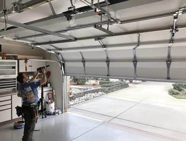 Garage door track repair service by Warrensville Heights Garage Door Repair in Warrensville Heights